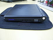Black 700 series unit side view showing the SD card reader, two USB ports, the VGA output and the Kensington Security Slot.